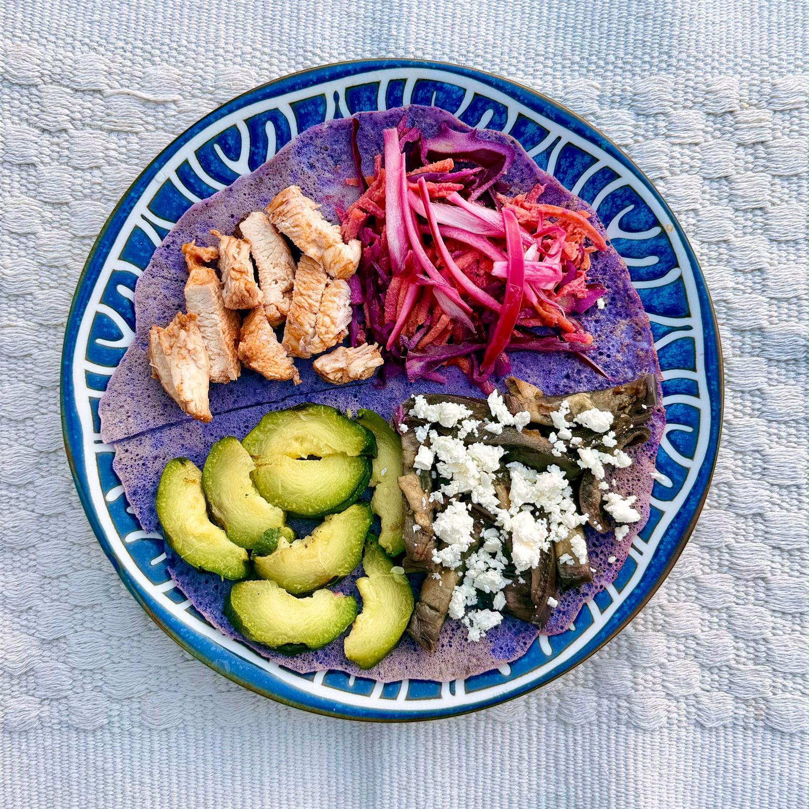 Colorful wrap filled with roasted chicken, grilled vegetables, and raw crudités — 1