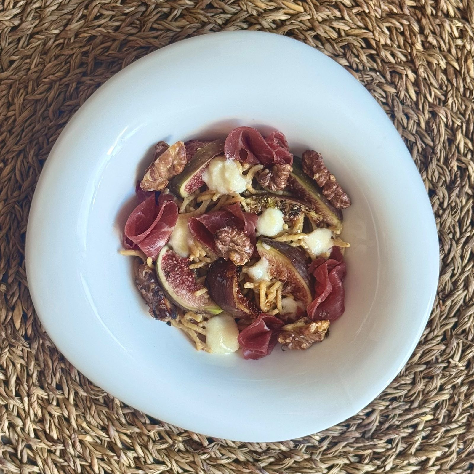 Homemade pasta with figs, bresaola & walnuts