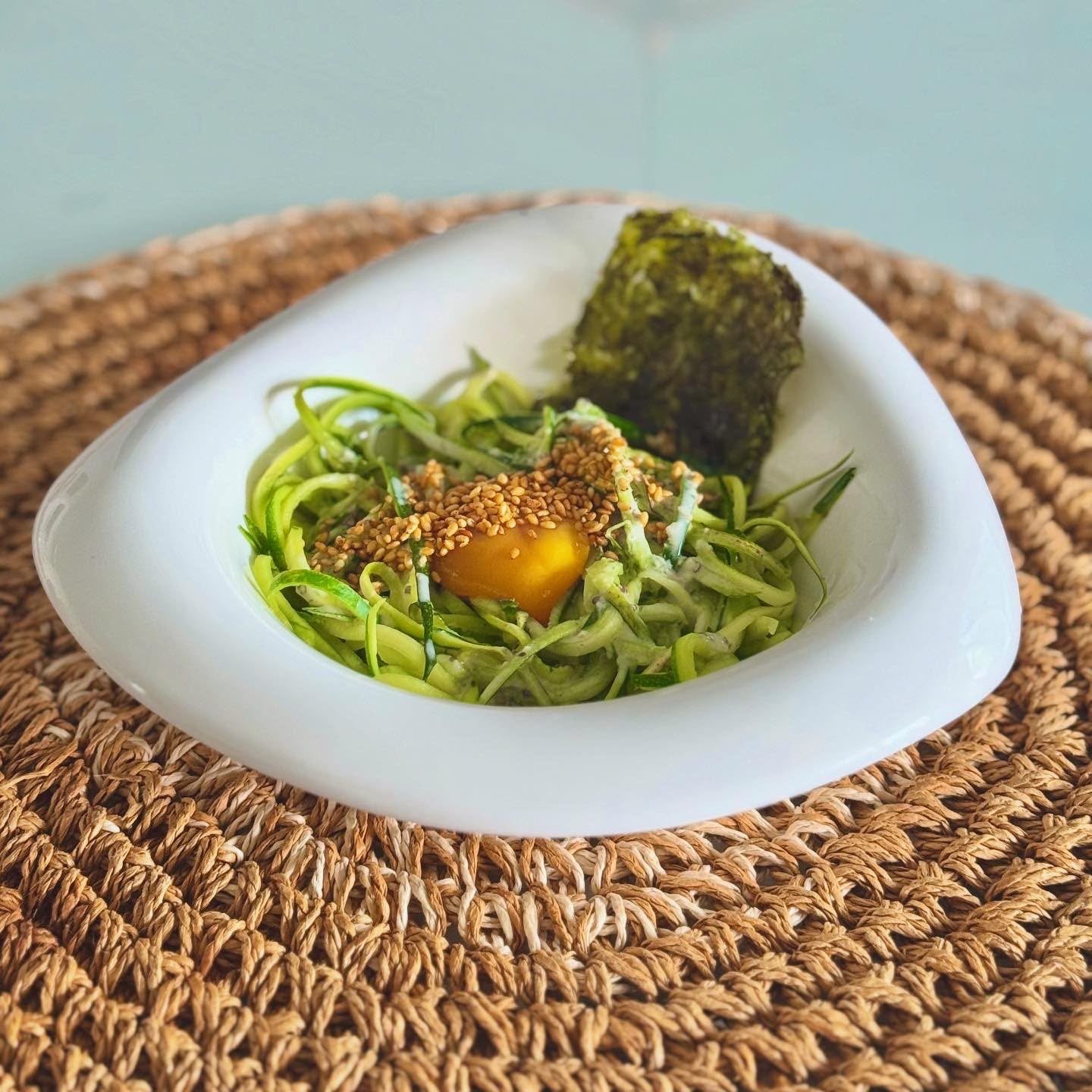 Miso-marinated zucchini tagliatelle with cured egg yolk
